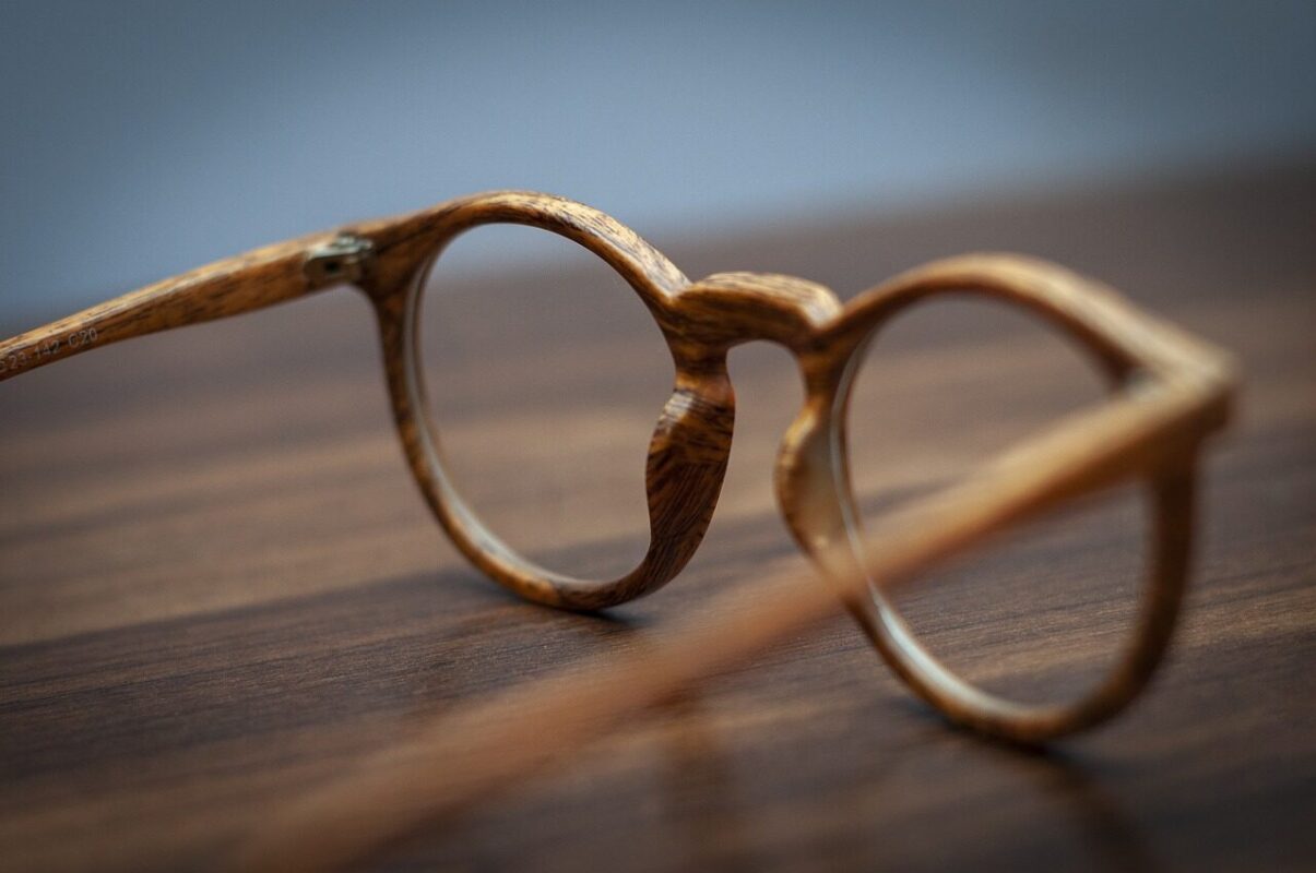 A pair of spectacle frames resting on a table